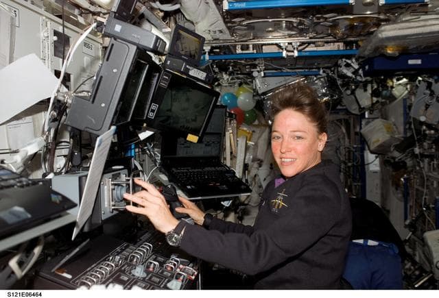 NASA image: Nowak works at the SSRMS during DTO 848 OPS on EVA3 during STS-121 / Expedition 13 joint operations