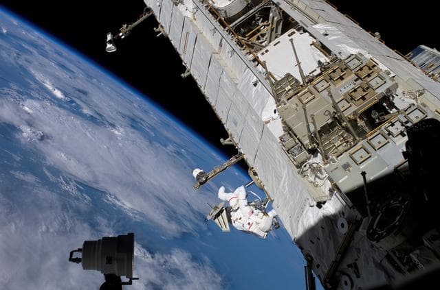 NASA image: Sellers translates along the S1 Truss during EVA3 on STS-121 / Expedition 13 joint operations