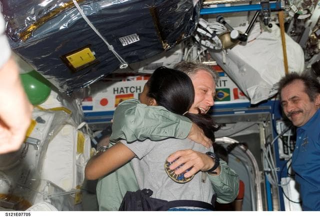 NASA image: Expedition 13 and STS-121 crewmembers say farewell before STS-121 undocking