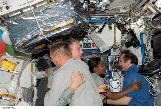 NASA image: Expedition 13 and STS-121 crewmembers say farewell before STS-121 undocking