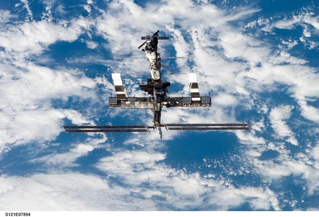 NASA image: Distant view of the ISS from the orbiter during separation on STS-121