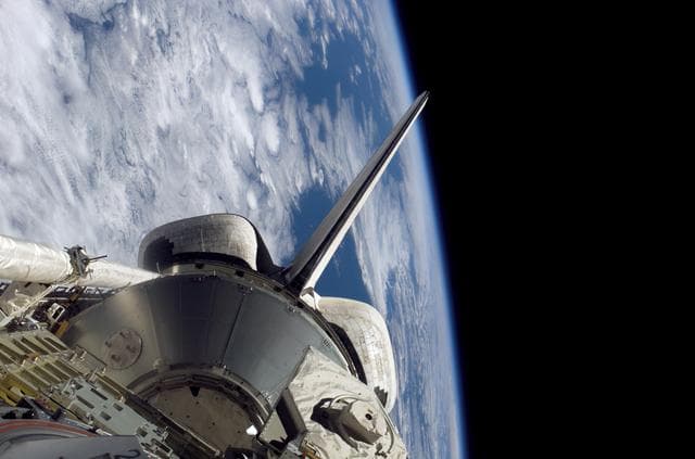 NASA image: The orbiter PLB and Earth limb during STS-121