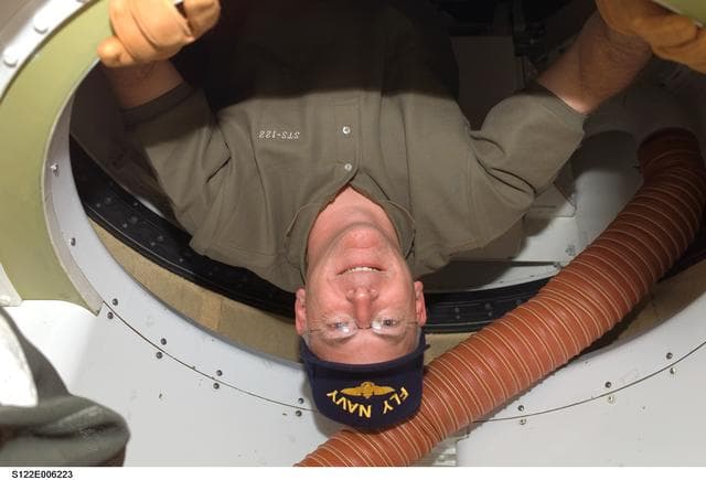 NASA image: Poindexter in hatch area of MDDK during STS-122
