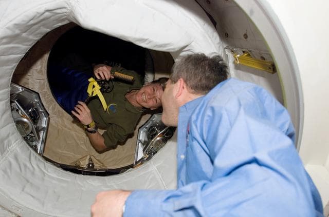 NASA image: Whitson greets Frick after Docking