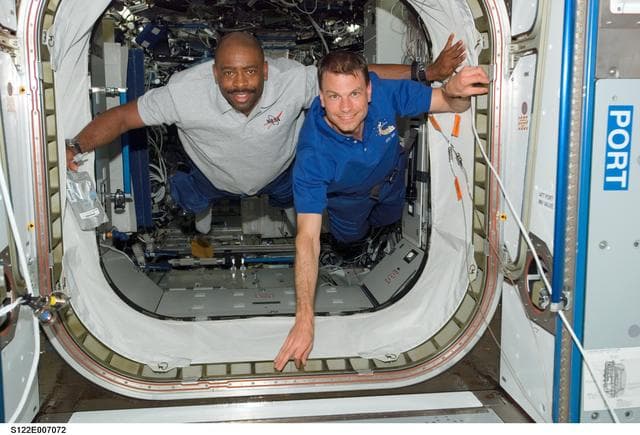 NASA image: Melvin and Love floating into Node 2