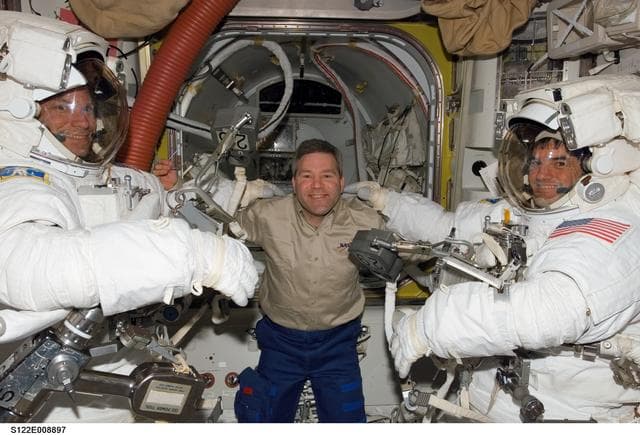 NASA image: Love, Frick and Walheim in the A/L prior to EVA 3