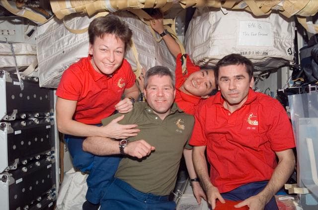 NASA image: Whitson, Frick, Tani and Malenchenko on Atlantis MDDK