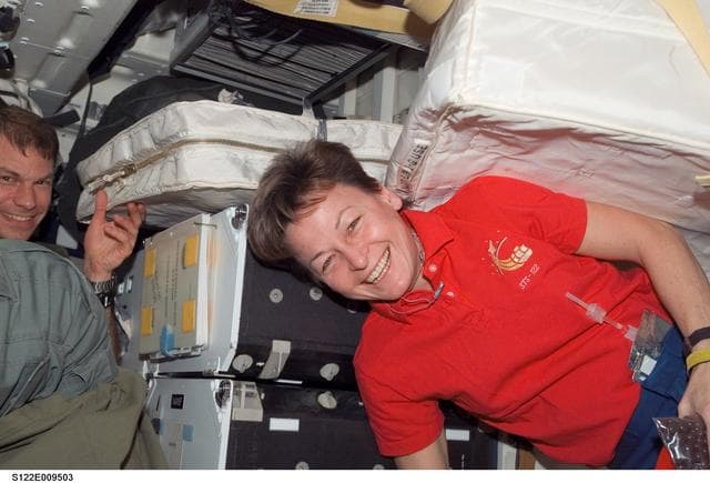 NASA image: Crewmembers share a meal on Atlantis MDDK
