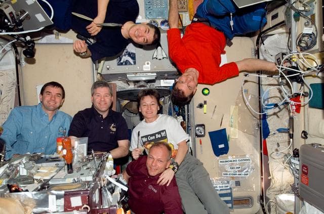 NASA image: Crewmembers share a meal in SM