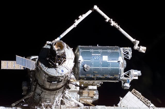 NASA image: Flyaround view of ISS after STS-122 Undocking