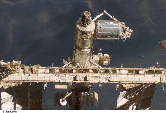 NASA image: Flyaround view of ISS after STS-122 Undocking