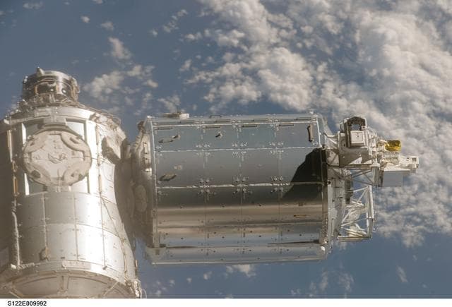 NASA image: Flyaround view of ISS after STS-122 Undocking