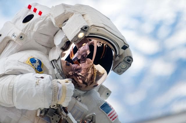 NASA image: Reisman on First EVA during STS-123 / Expedition 16 Joint Operations