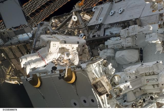 NASA image: First EVA during STS-123 / Expedition 16 Joint Operations