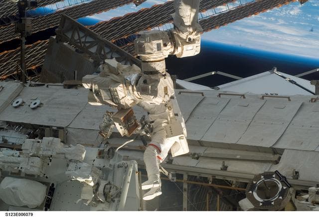 NASA image: First EVA during STS-123 / Expedition 16 Joint Operations
