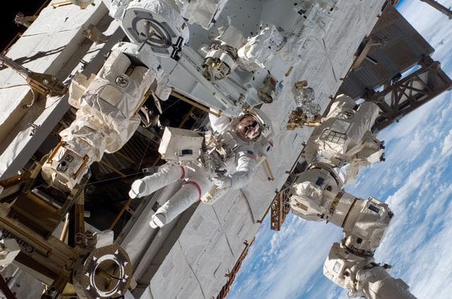 NASA image: First EVA during STS-123 / Expedition 16 Joint Operations