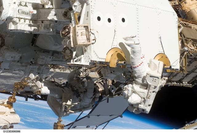 NASA image: First EVA during STS-123 / Expedition 16 Joint Operations