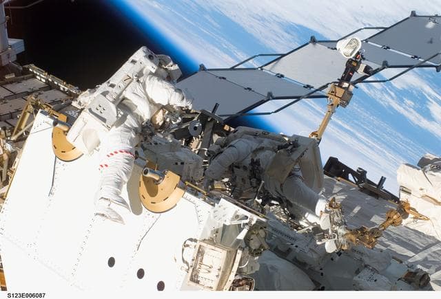 NASA image: First EVA during STS-123 / Expedition 16 Joint Operations