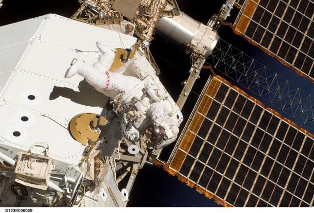 NASA image: First EVA during STS-123 / Expedition 16 Joint Operations