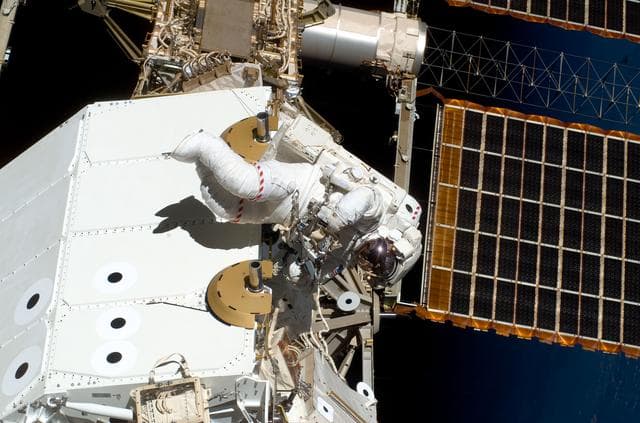 NASA image: First EVA during STS-123 / Expedition 16 Joint Operations