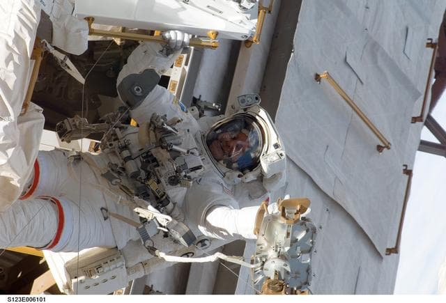 NASA image: First EVA during STS-123 / Expedition 16 Joint Operations