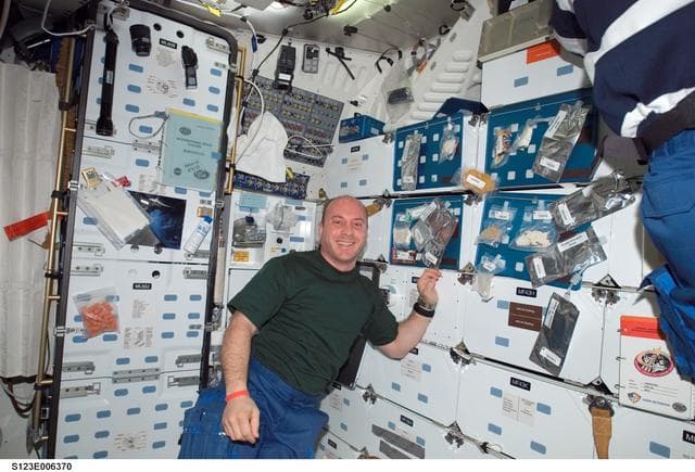 NASA image: Reisman in the FWD MDDK during Joint Operations