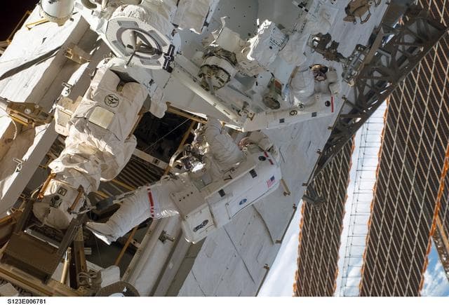 NASA image: Linnehan and Foreman on EVA 2 - during Expedition 16 / STS-123 Joint Operations