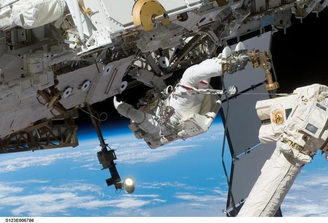 NASA image: Linnehan and Foreman on EVA 2 - during Expedition 16 / STS-123 Joint Operations