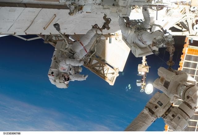 NASA image: Linnehan and Foreman on EVA 2 - during Expedition 16 / STS-123 Joint Operations