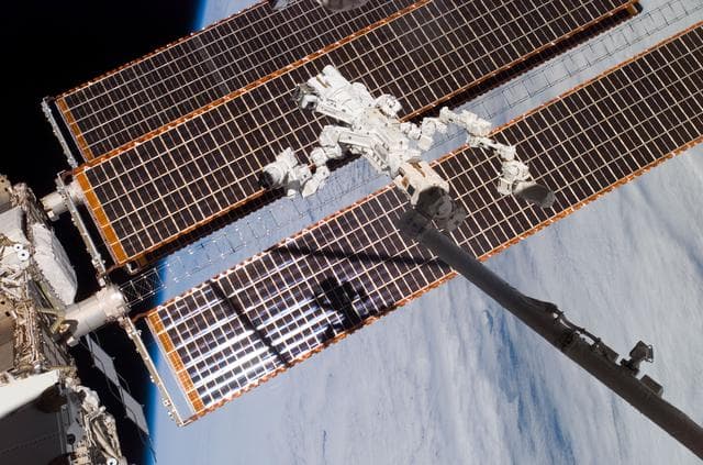 NASA image: Dextre and SAWs during Expedition 16 / STS-123 Joint Operations