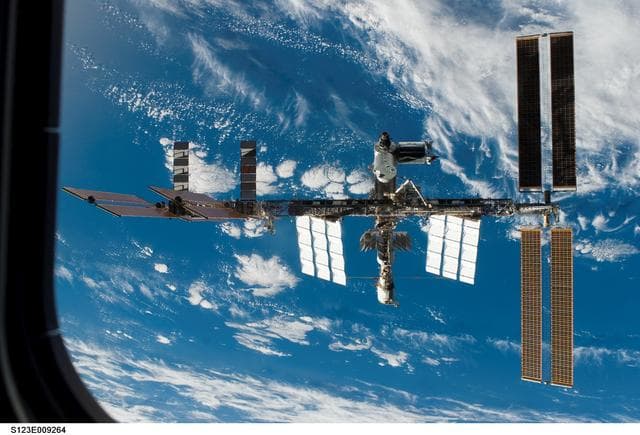 NASA image: Flyaround view of the ISS taken from STS-123 Space Shuttle Endeavor