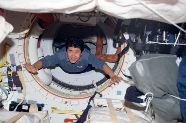 NASA image: Doi passes through A/L hatch on Space Shuttle Endeavor during Joint Operations