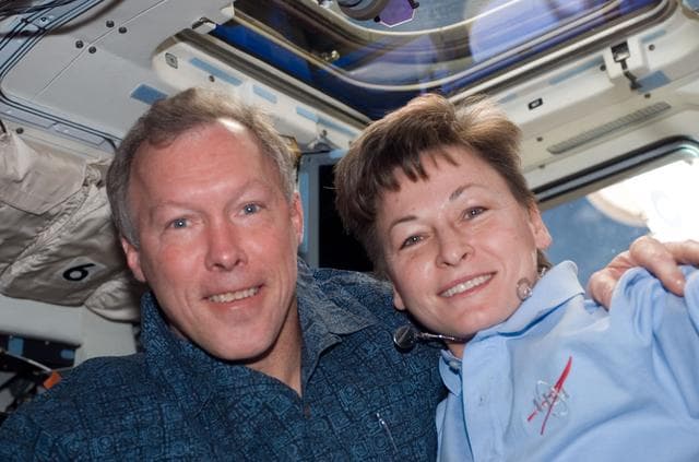 NASA image: Gorie and Whitson pose for photo on the aft FD during Joint Operations