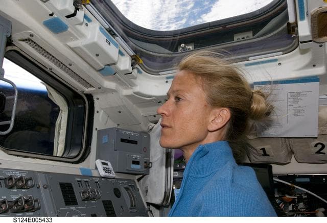 NASA image: Nyberg at aft deck controls