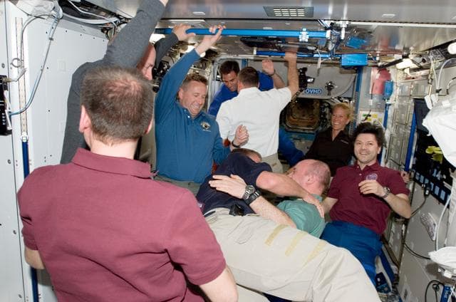 NASA image: STS-124 and Expedition 17 crew greet after docking