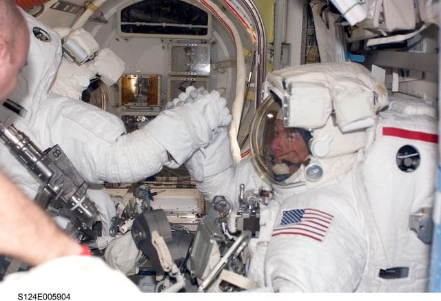 NASA image: Garan and Fossum in airlock prior to EVA 1