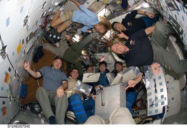 NASA image: STS-124 and ISS 17 crew on shuttle middeck