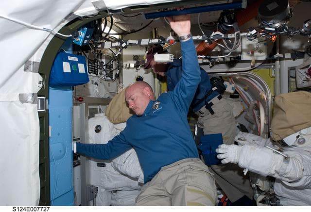 NASA image: Kelly and Fossum in Airlock