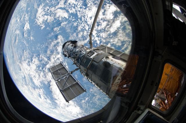 NASA image: Hubble Space Telescope (HST) during rendezvous with STS-125 Shuttle Atlantis