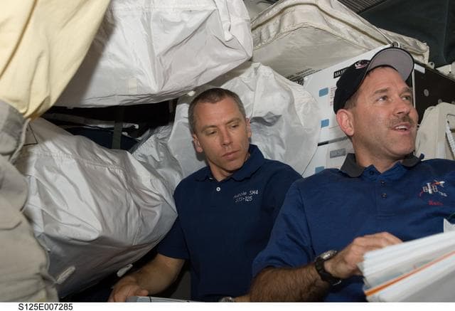NASA image: STS-125 Crew Members in the Middeck during Flight Day 3
