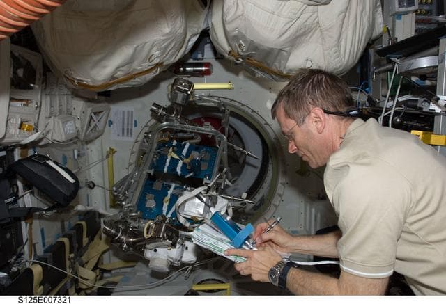 NASA image: STS-125 MS1 Johnson working in the MDDK