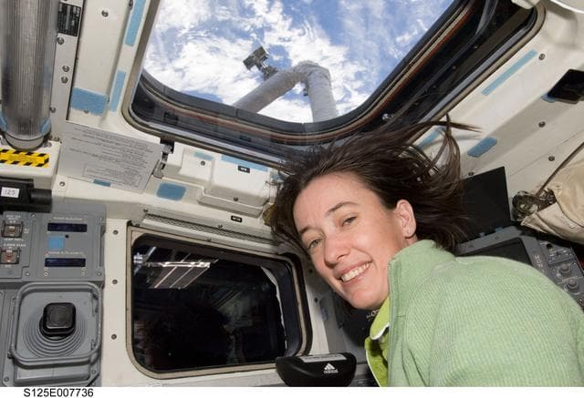 NASA image: STS-125 MS2 McArthur poses for a photo on the FD during Flight Day 5