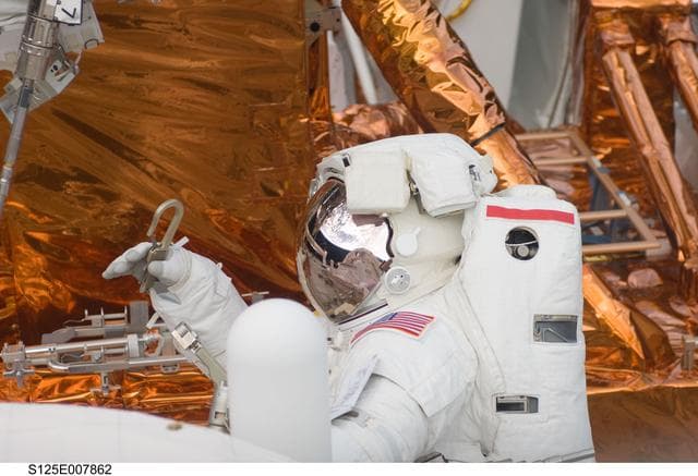 NASA image: STS-125 MS3 Grunsfeld during EVA3
