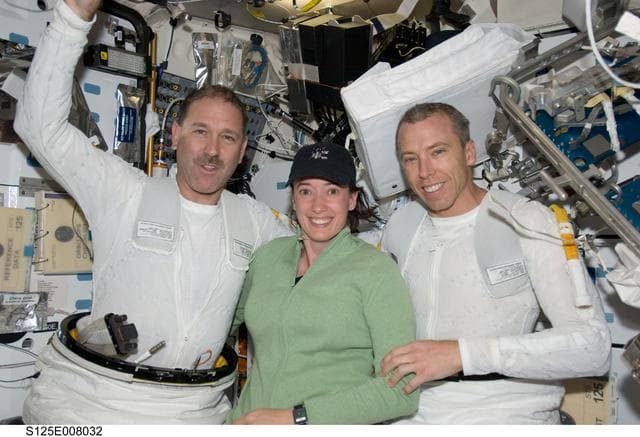 NASA image: STS-125 Crew Members pose for a photo in the MDDK after EVA3