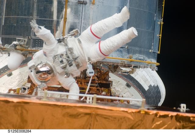 NASA image: STS-125 MS3 Grunsfeld during EVA3