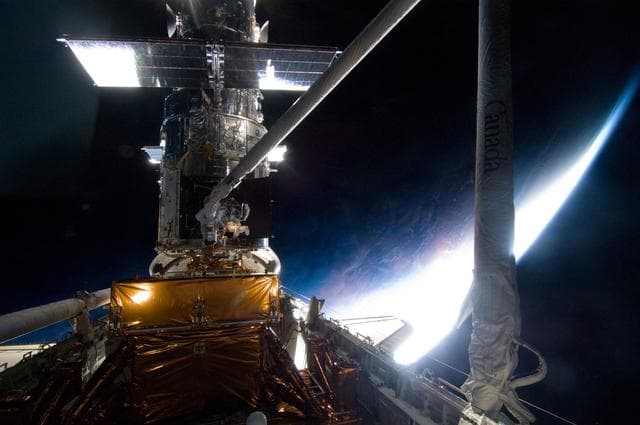 NASA image: STS-125 MS1 Good and MS4 Massimino during EVA4