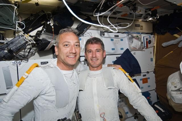 NASA image: STS-125 MS1 Good and MS4 Massimino after completing EVA4