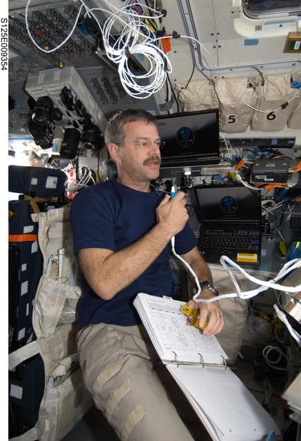 NASA image: STS-125 CDR Altman working on the Flight Deck