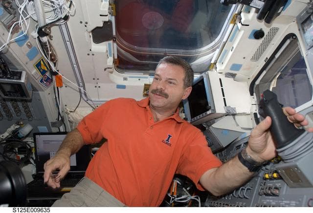 NASA image: View of CDR Altman on the aft Flight Deck during Flight Day 8