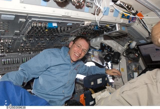 NASA image: STS-125 Pilot Gregory Johnson on the Flight Deck during Flight Day 8